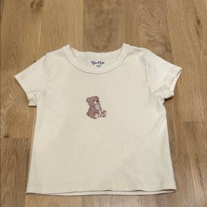 Brandy Melville Cream Tee with Bear Graphic